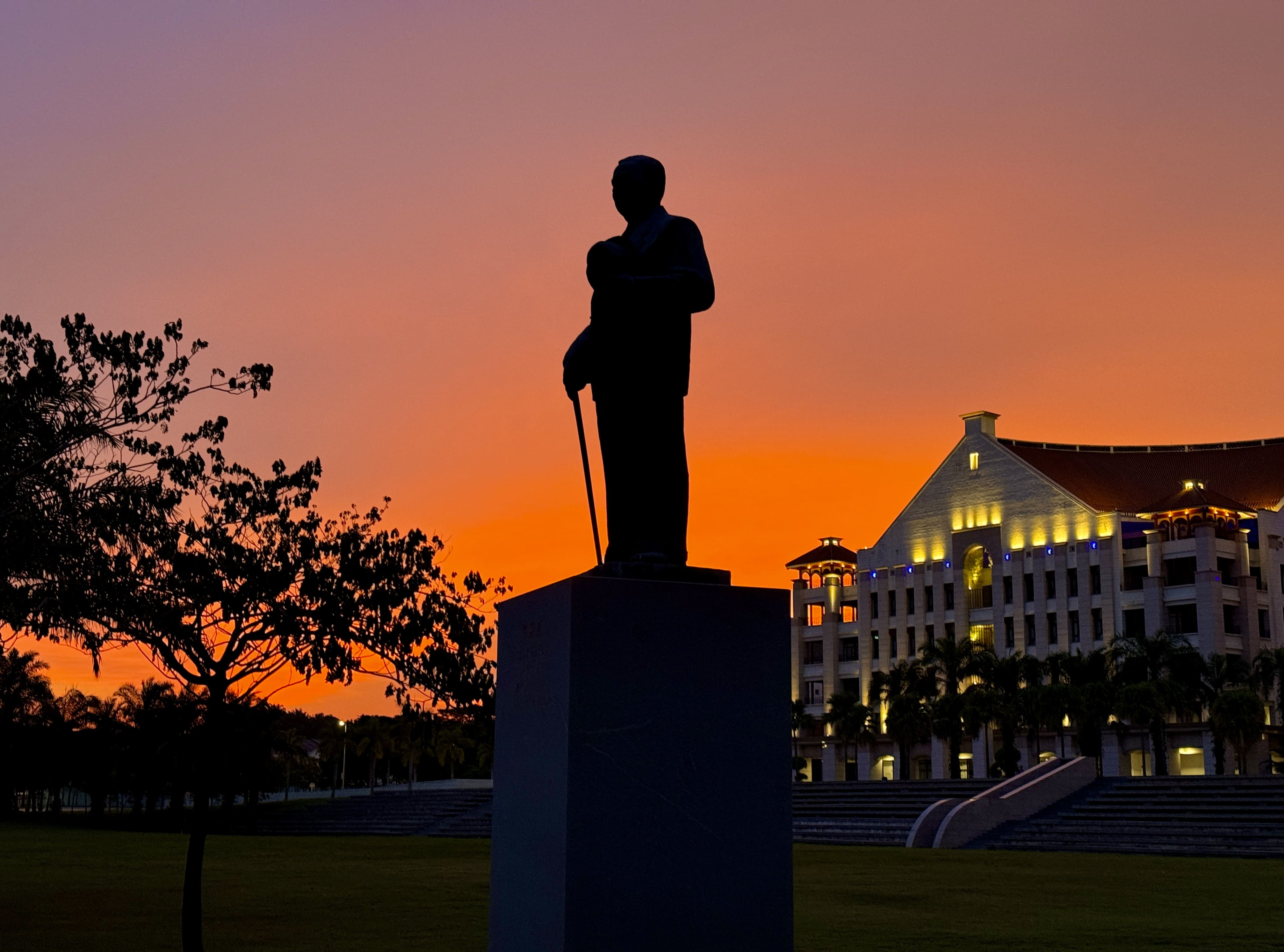 University building and statue at sunset at Xiamen University Malaysia